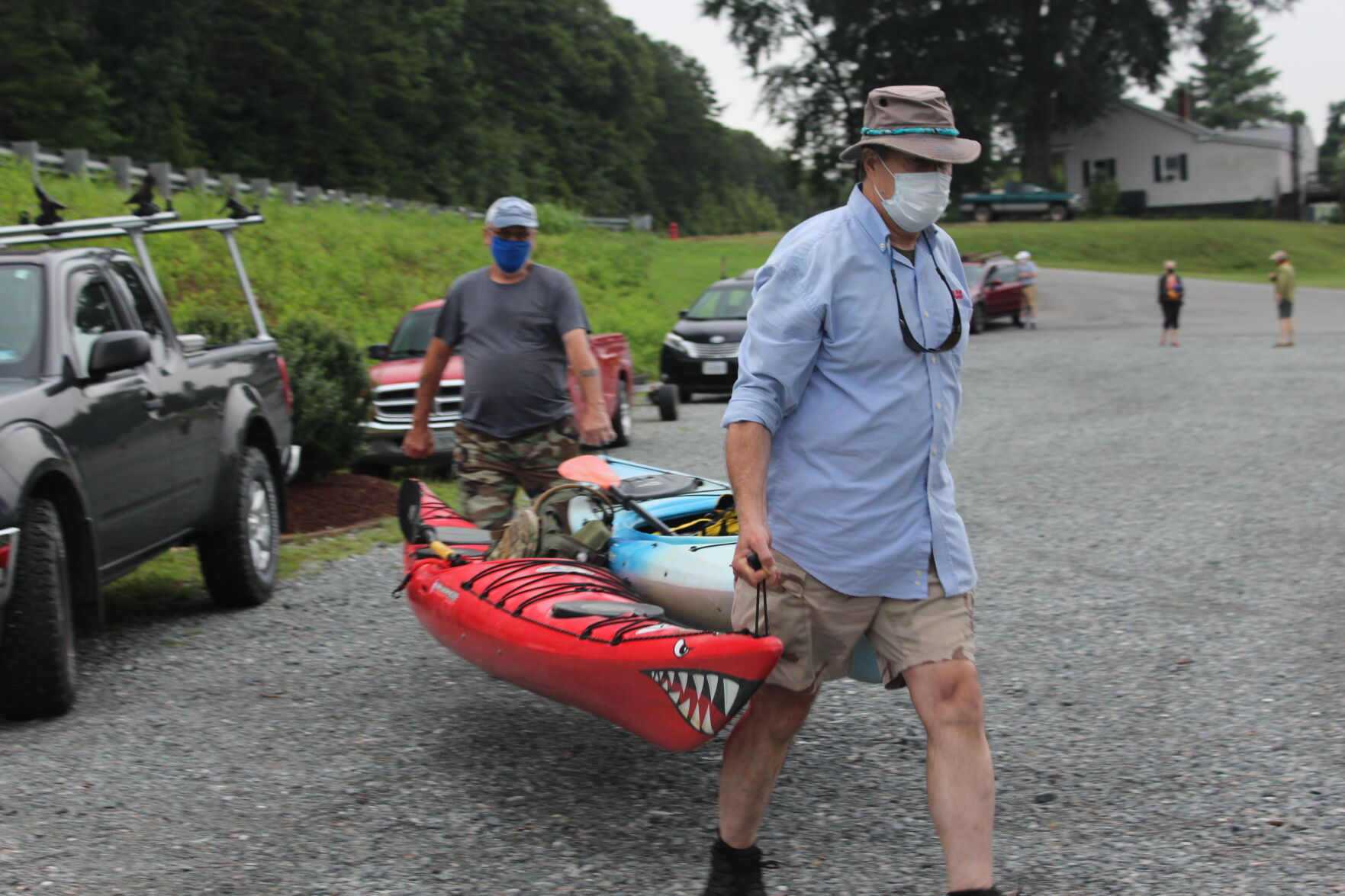 Paul Lowery and John Johnson unloads their kayaks